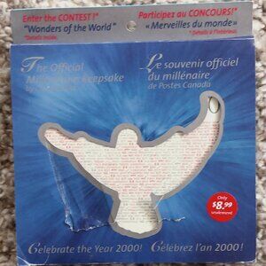 Canada 1999 - 2000 Millennium Keepsake coin and stamp keepsake in tin